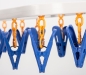 Preview: Wäschehänger mit 28 Klammern farblich sortiert, 35x35 cm